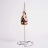 An Endearing St Nick Glass Gem Ornament