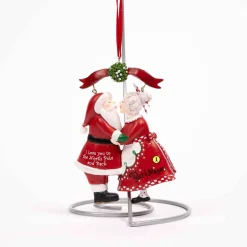 Santa And Mrs. Claus Under Mistletoe